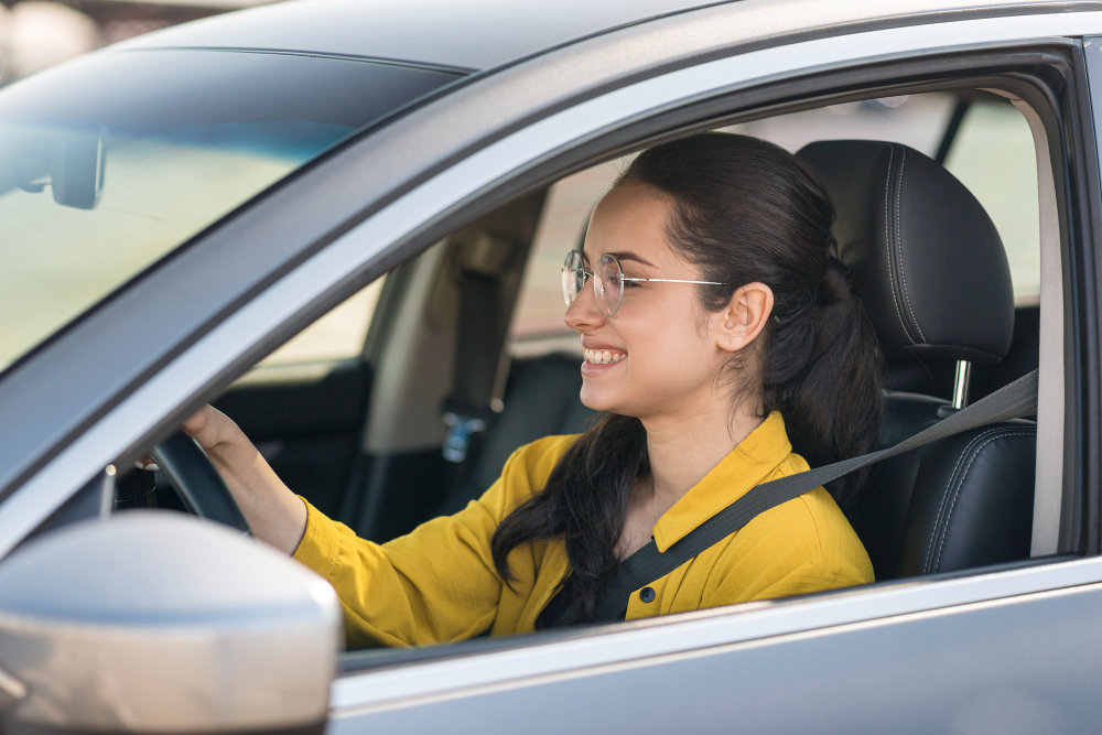 Instructor teaching a student to drive